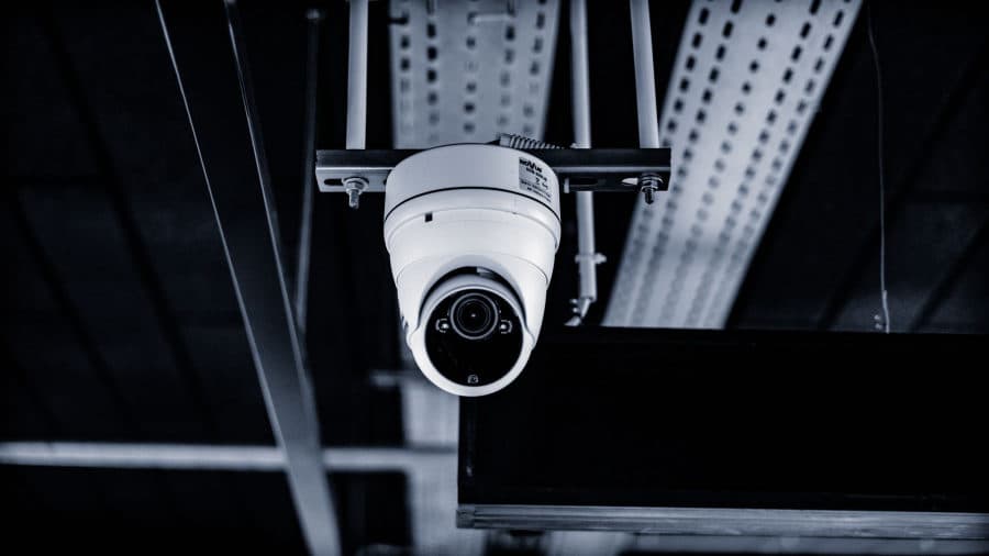 HD CCTV dome camera mounted on a ceiling rig